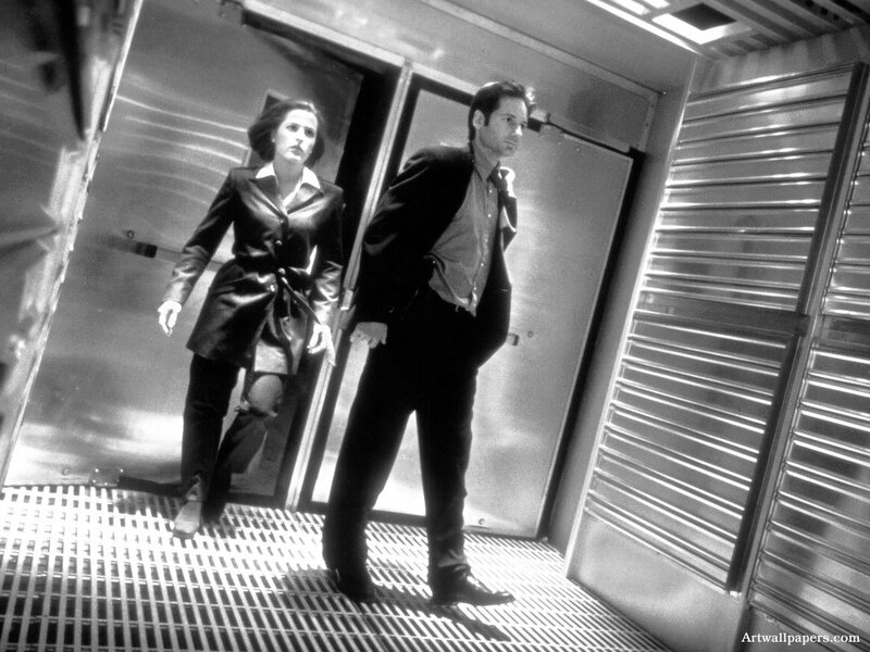 man and woman in metal corridor