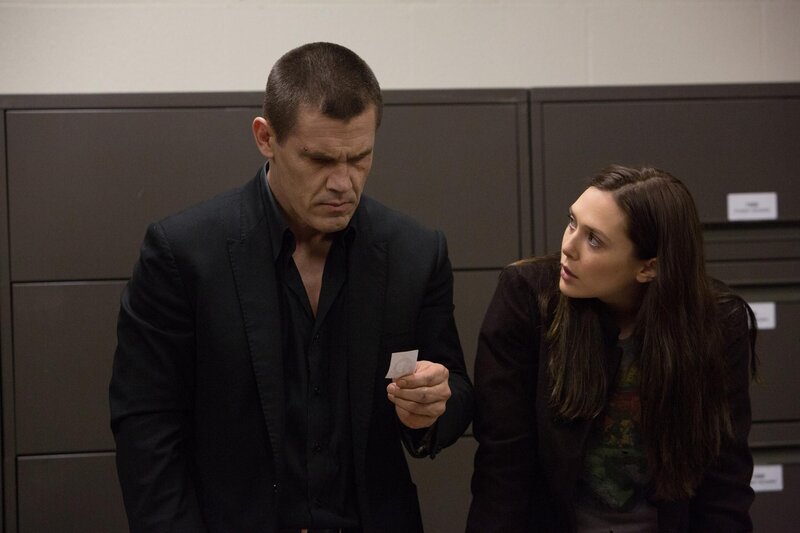 Man and Woman in Office — Black, Serious