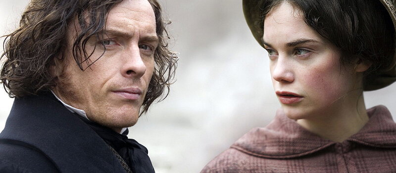 man and woman in period clothing