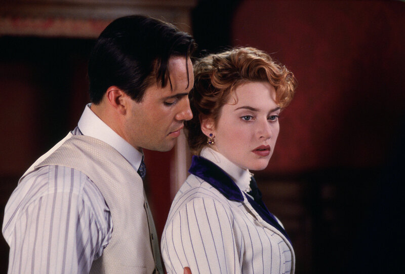 Man and Woman in Period Clothing — White, Dramatic, Photograph, Vest