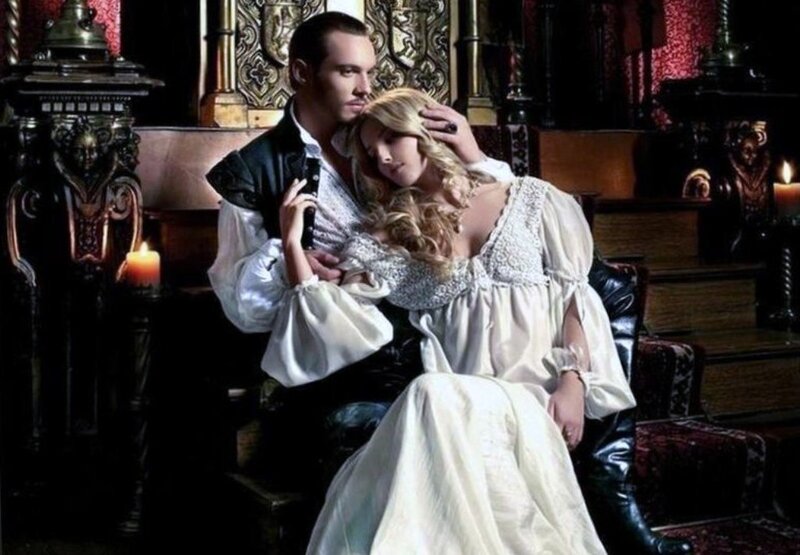 Man and Woman in Period Clothing — White