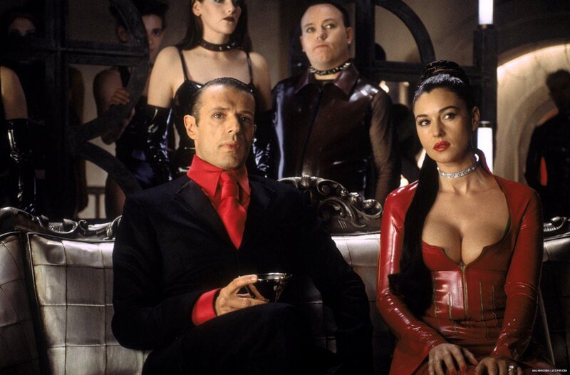 Man and woman in red outfits