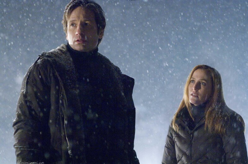 man and woman in snowstorm