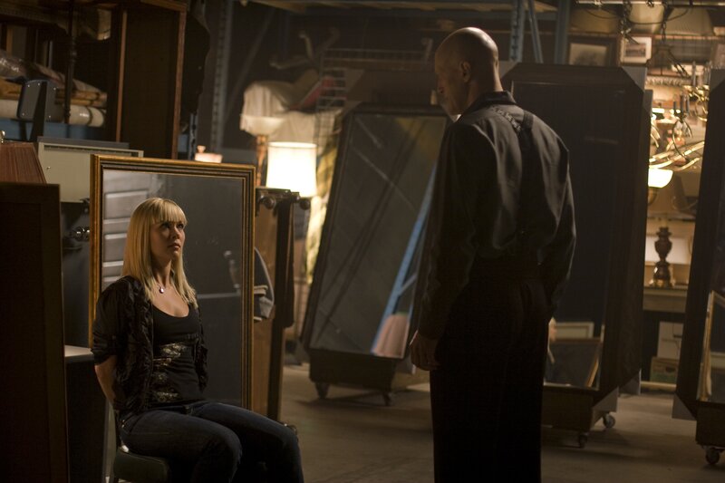 Man and woman in storage room