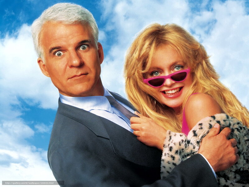 Man and woman in suit and sunglasses