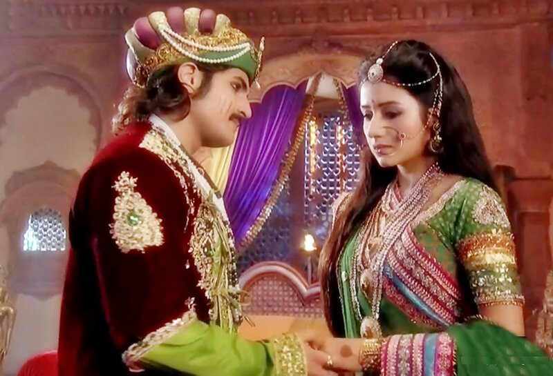 Man and Woman in Traditional Attire — Green