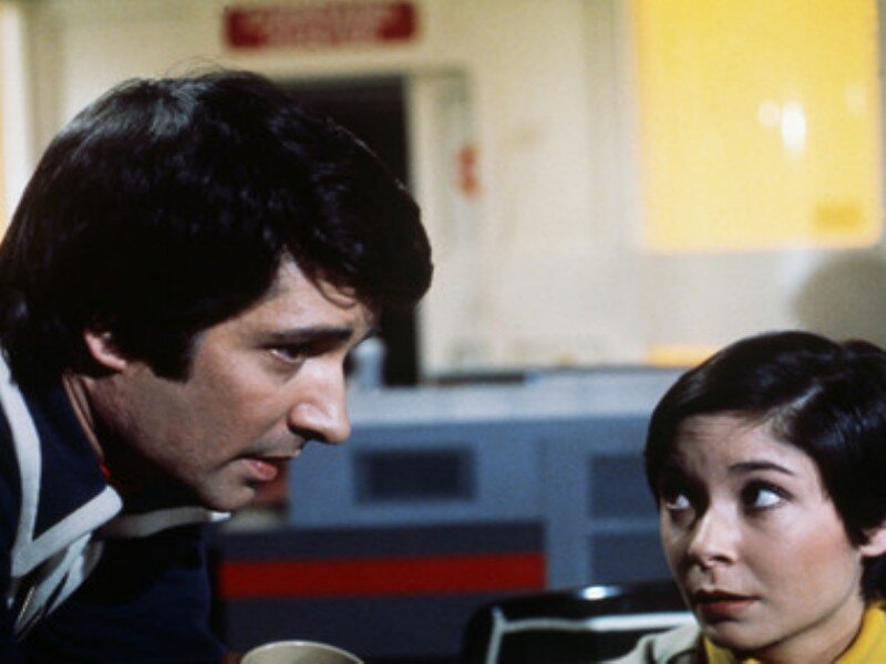 Man and Woman in Uniform — Blue