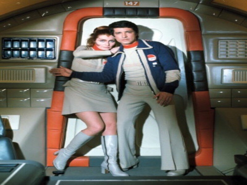 Man and Woman in Uniform — Gray, Dramatic