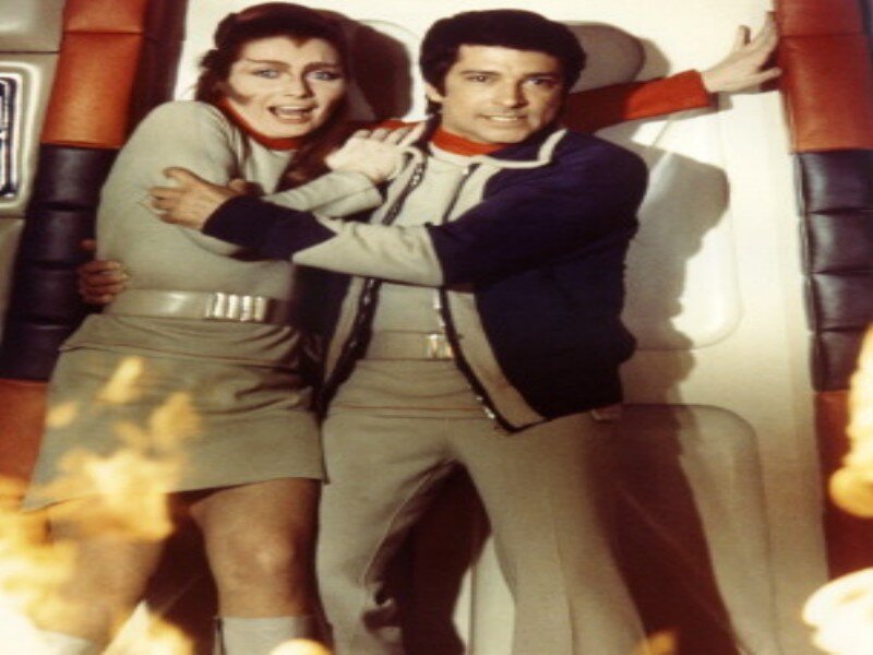 Man and Woman in Uniform — Gray