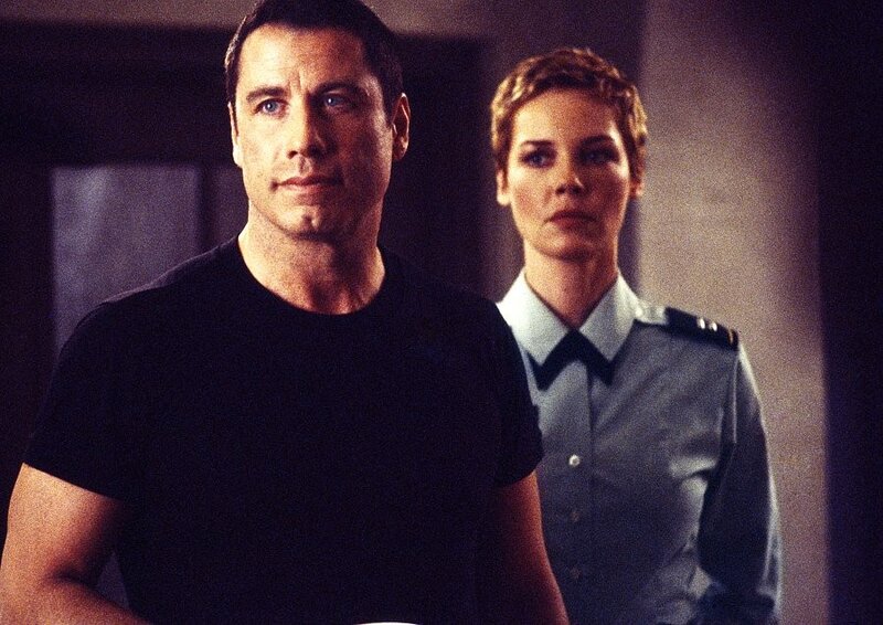 man and woman in uniform
