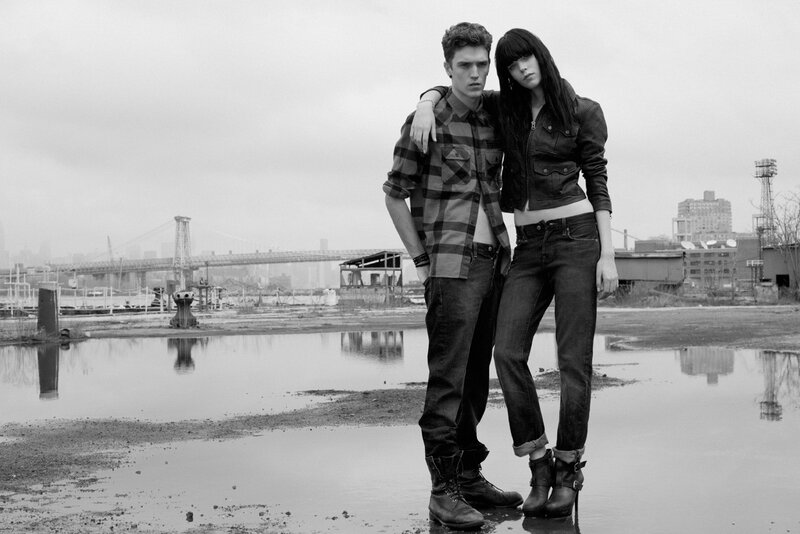 Man and Woman in Urban Setting — Black