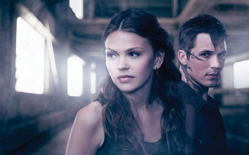 Man and Woman in Warehouse — Blue