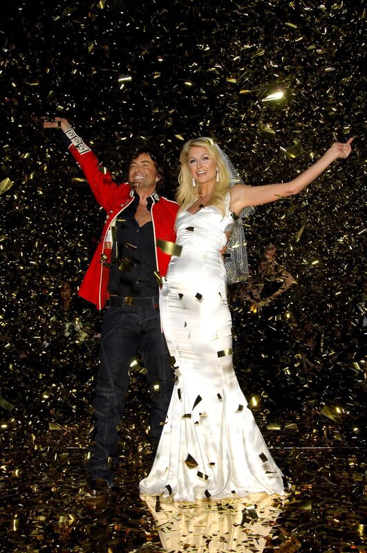 Man and Woman in Wedding Attire — White, Celebratory, Night