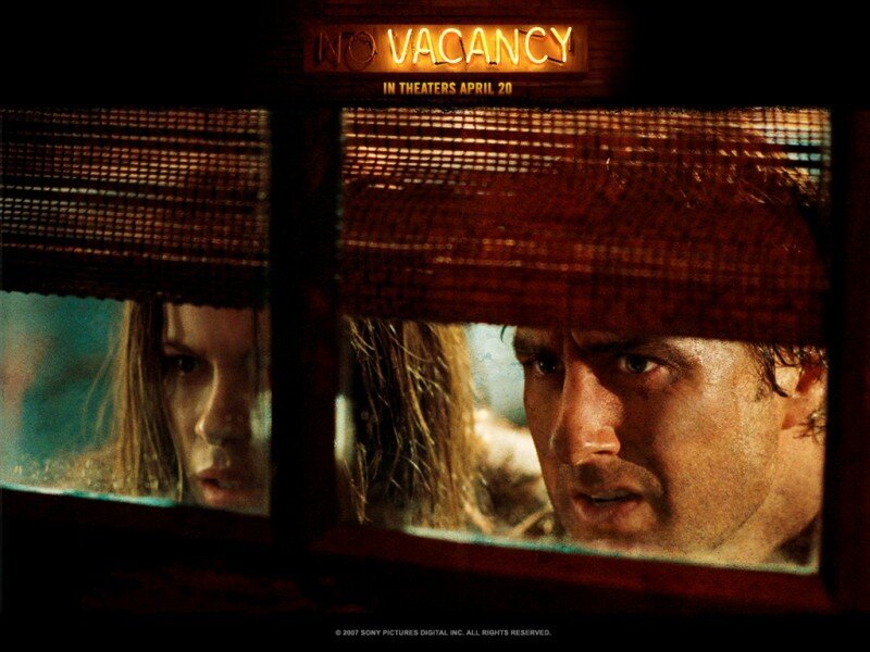 Man and Woman in Window