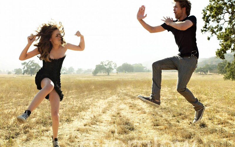 Man and Woman Jumping — Brown