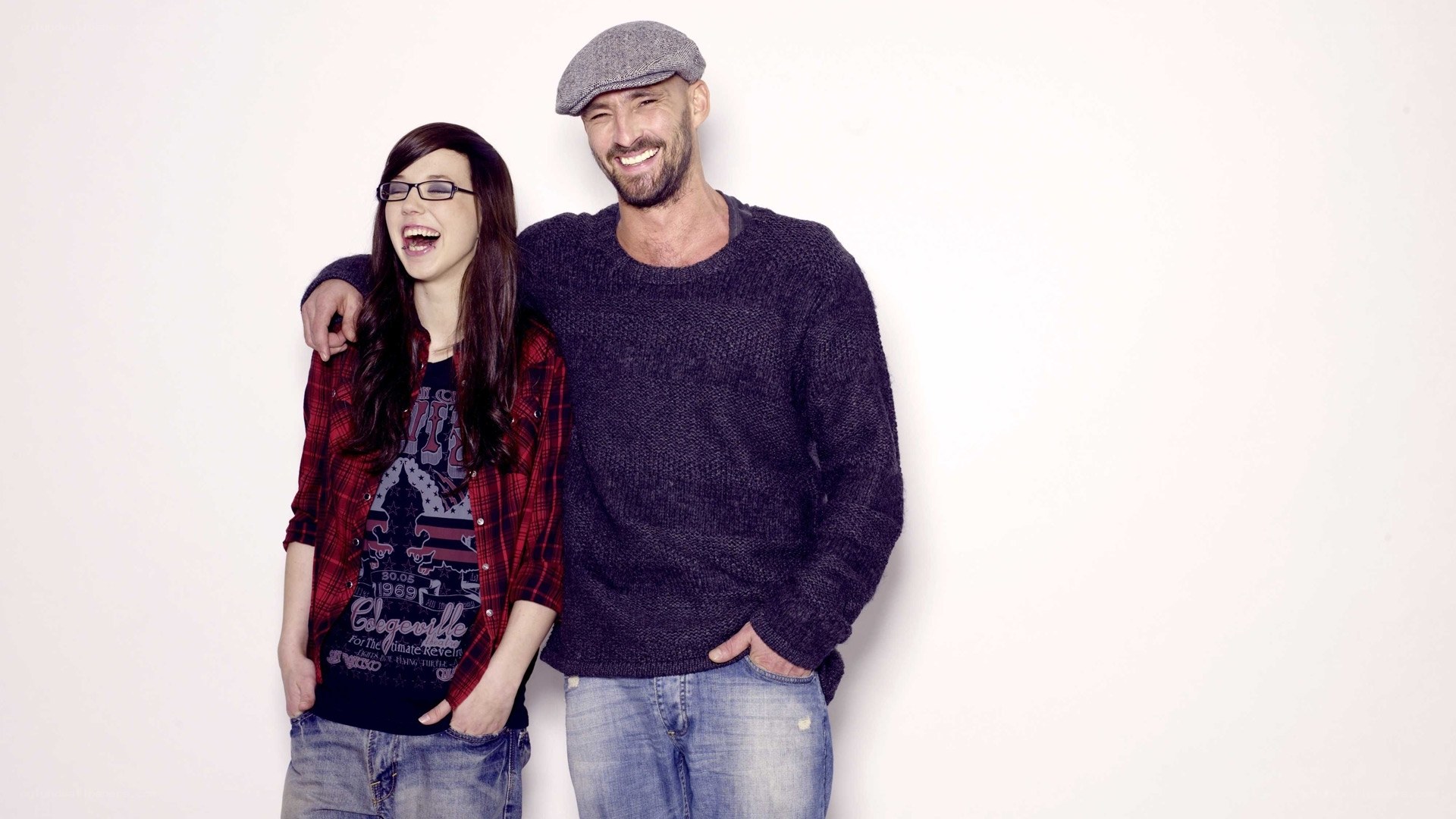 man and woman laughing together