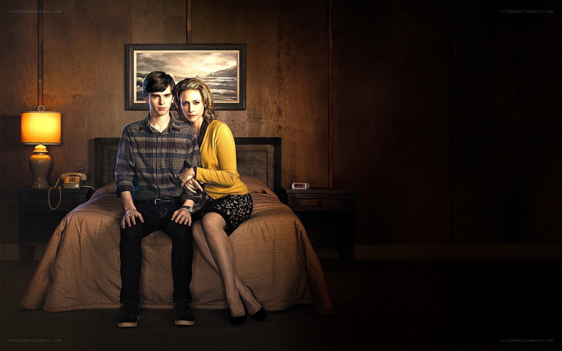 man and woman on a bed