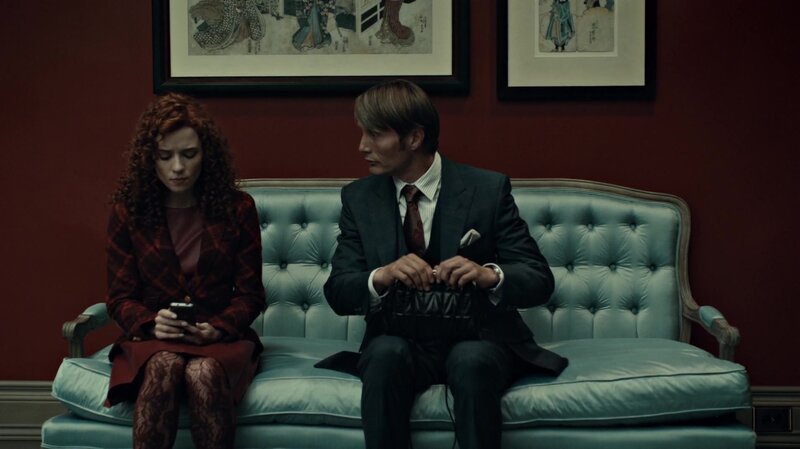 man and woman on a couch