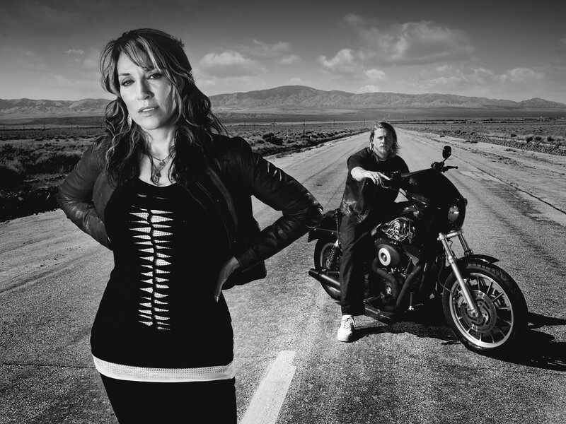 Man and woman on a desert road
