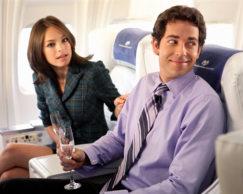 Man and woman on airplane