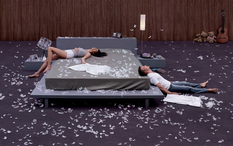 Man and Woman on Bed — Gray