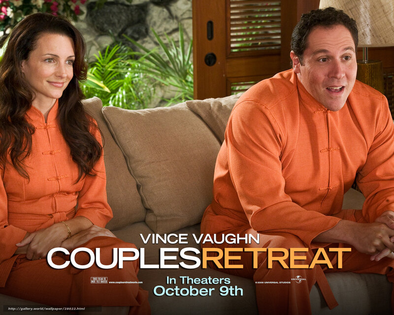 Man and Woman on Couch — Orange