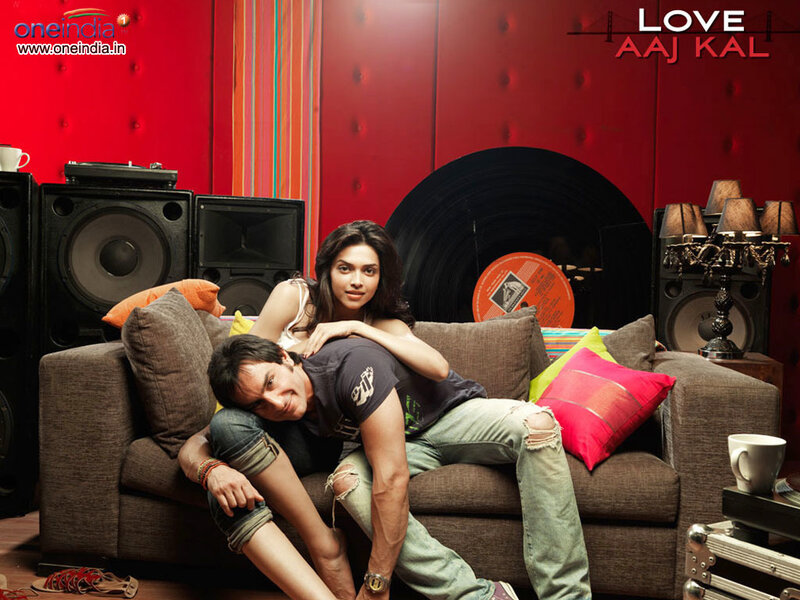 Man and Woman on Couch — Red