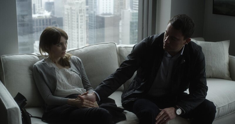 man and woman on couch