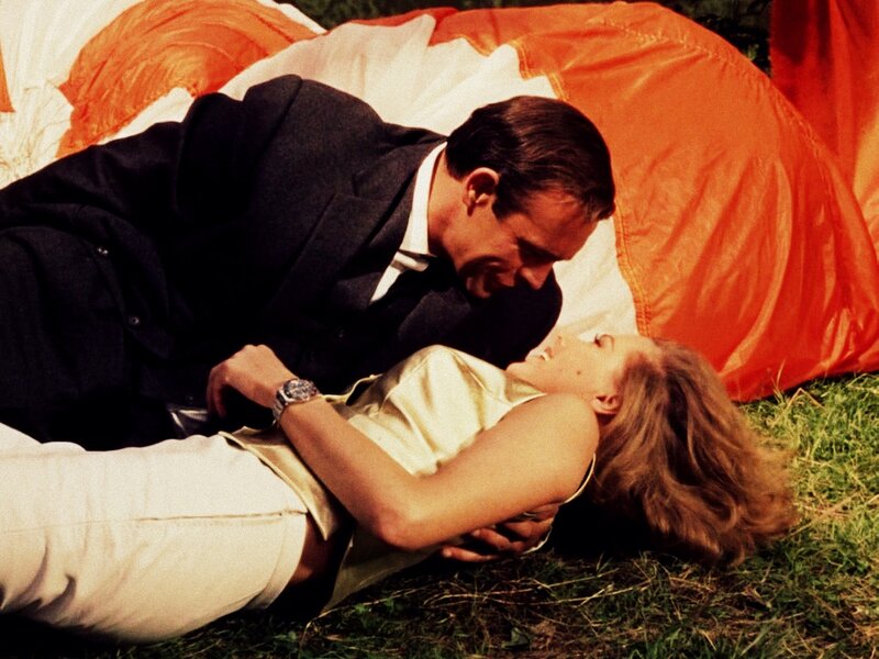 Man and Woman on Grass — Orange