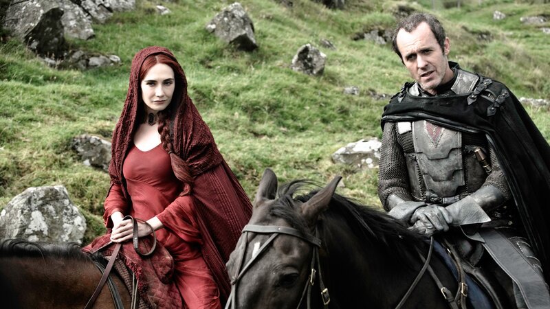 Man and woman on horseback