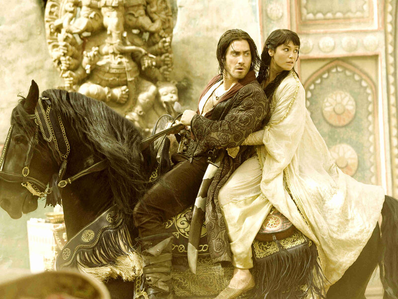 Man and woman on horseback