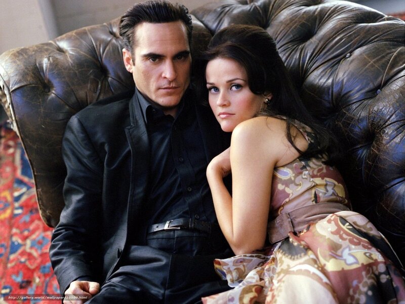 Man and woman on leather couch