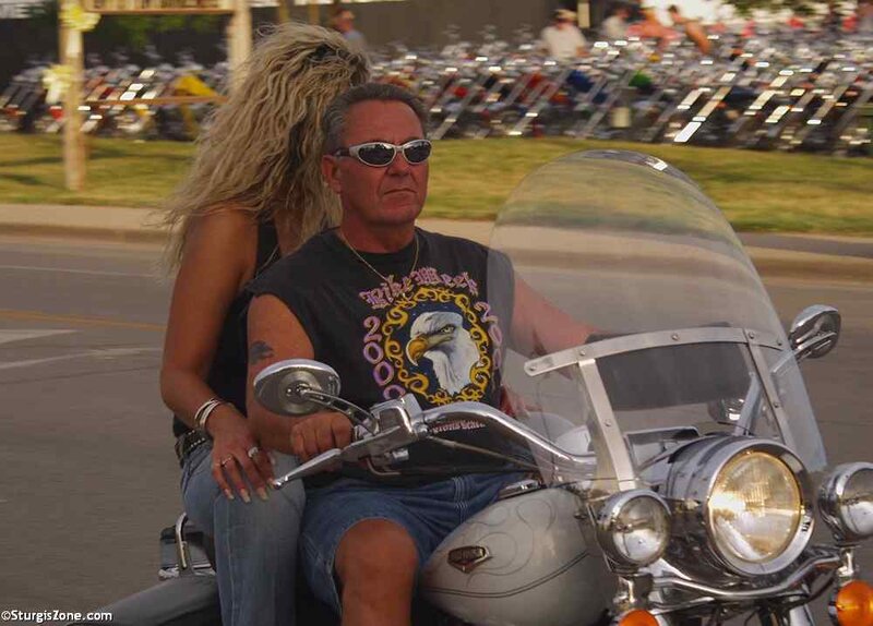 Man and Woman on Motorcycle — Gray