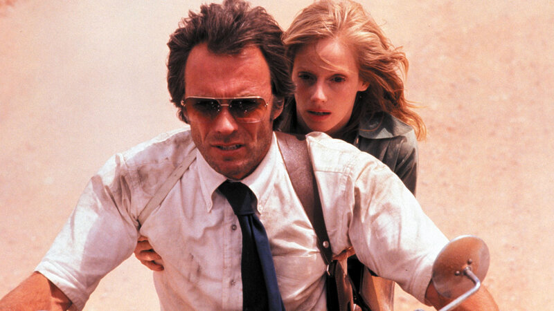 Man and Woman on Motorcycle — White