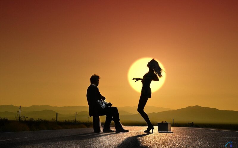 Man and Woman on Road — Orange