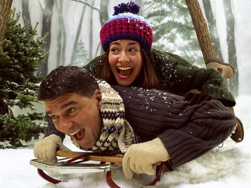 Man and Woman on Sled