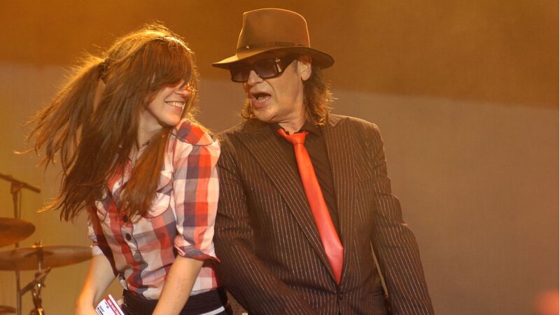 Man and woman on stage together