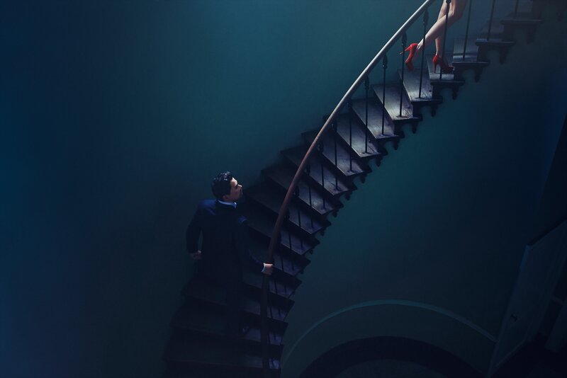 Man and Woman on Stairs — Blue