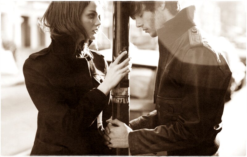 Man and Woman on Street — Brown, Dramatic