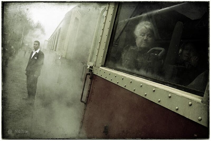 Man and Woman on Train — Gray