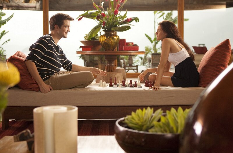 Man and Woman Playing Chess — Brown