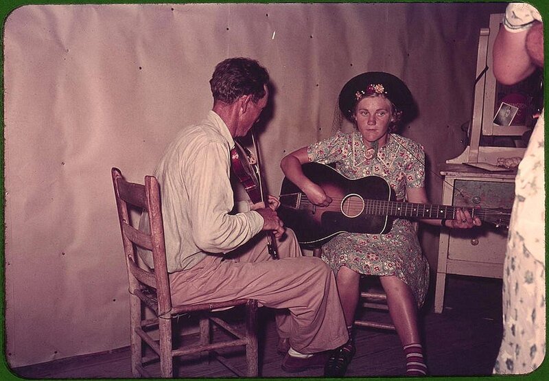 Man and woman playing music together