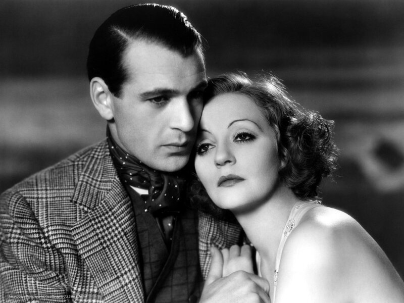 Man and Woman Posing — Black, Dramatic, Photograph, Plaid Jacket