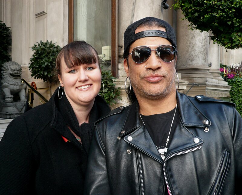Man and Woman Posing — Black, Neutral, Photograph, Sunglasses