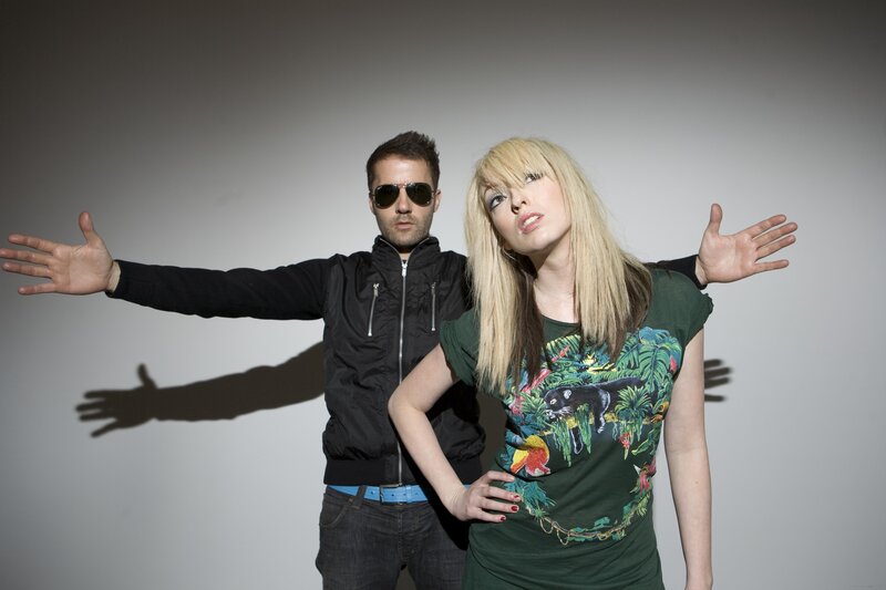 man and woman posing together