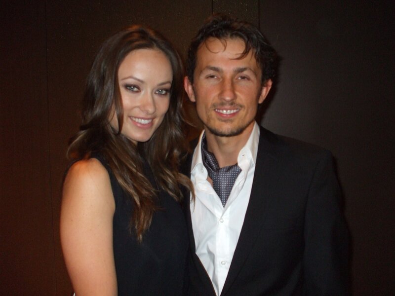 man and woman posing together