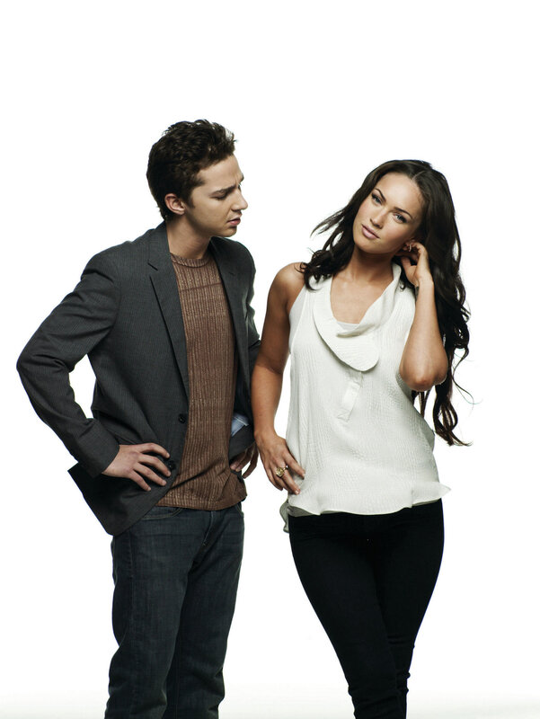 man and woman posing together
