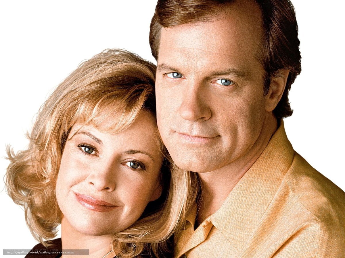 man and woman posing together