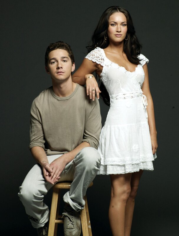 Man and Woman Posing — White, Neutral, Photograph, Stool