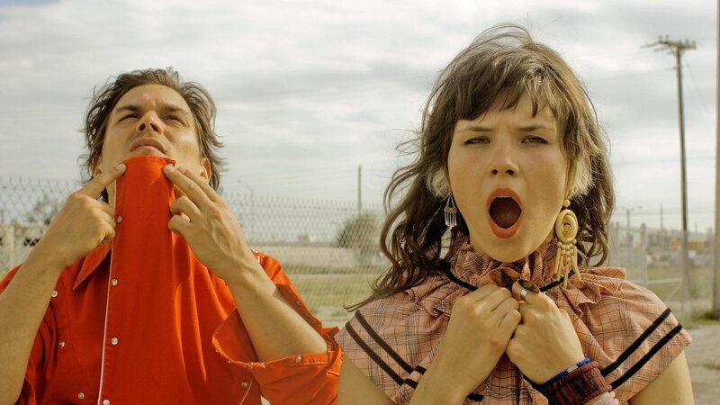 Man and woman pulling collars